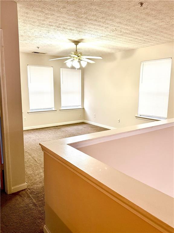 3162 Panthers Trace Decatur, GA 30034 - Photo 15 of 20 a view of a kitchen with wooden floor and chandelier