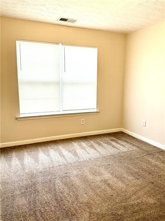 3162 Panthers Trace Decatur, GA 30034 - Photo 20 of 20 an empty room with a window
