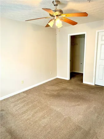 a view of a small space with a fan