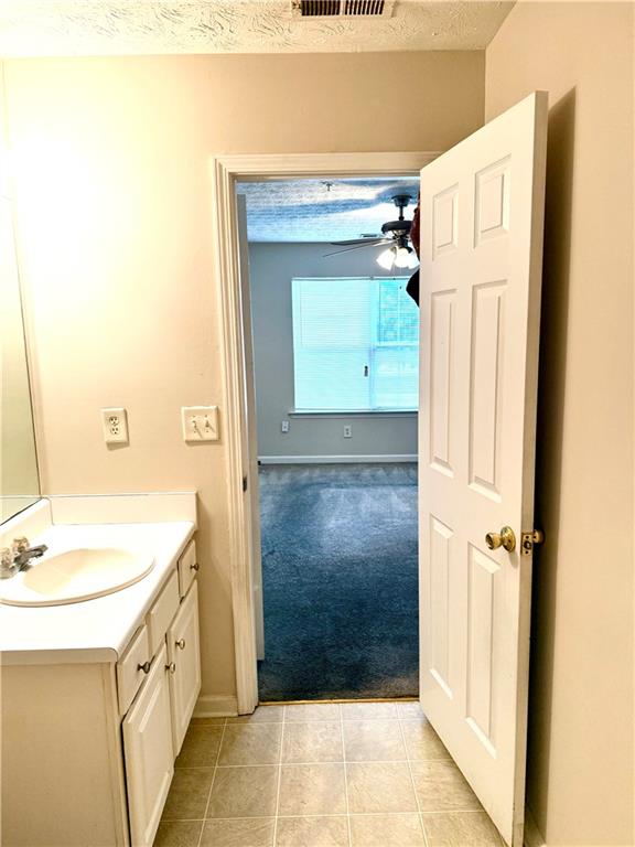 3162 Panthers Trace Decatur, GA 30034 - Photo 7 of 20 a bathroom with a sink a mirror and a shower