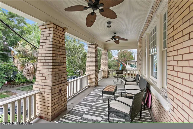 a view of a porch with furniture