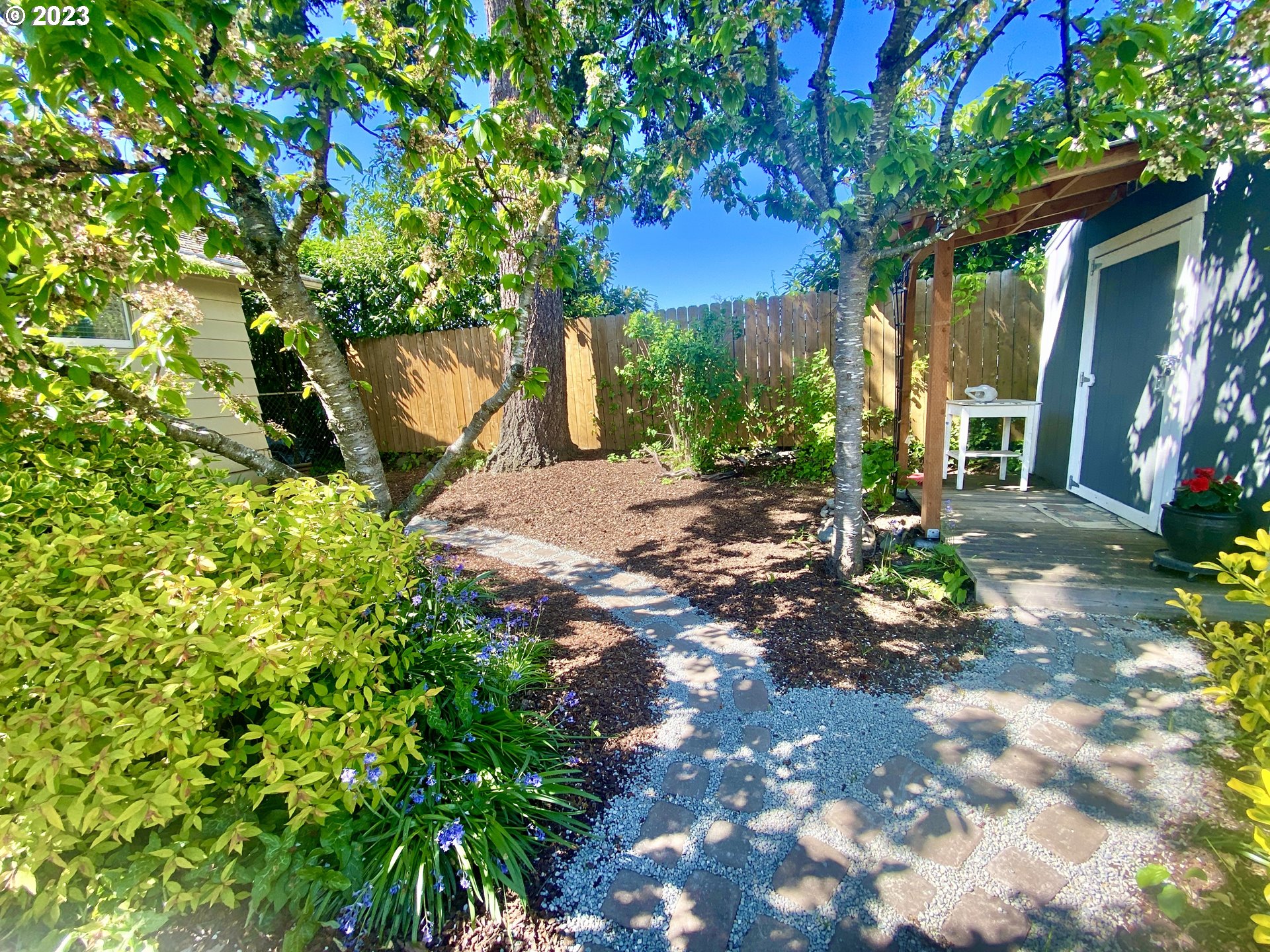 2181 5th Street Springfield, OR 97477 - Photo 29 of 39 a view of a tree in front of a house