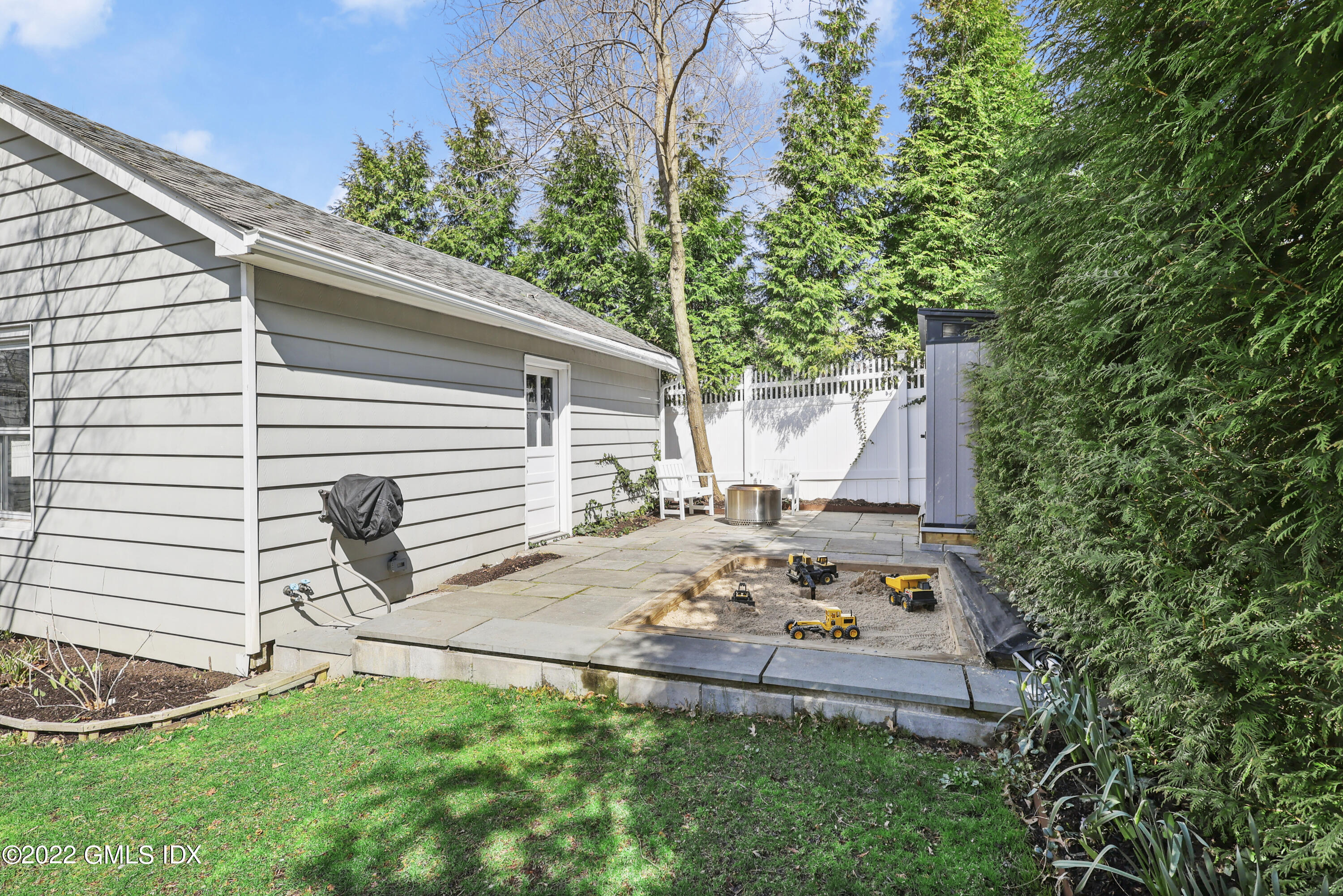 10 Butler Street Cos Cob, CT 06807 - Photo 31 of 43 a view of a house with backyard and sitting area