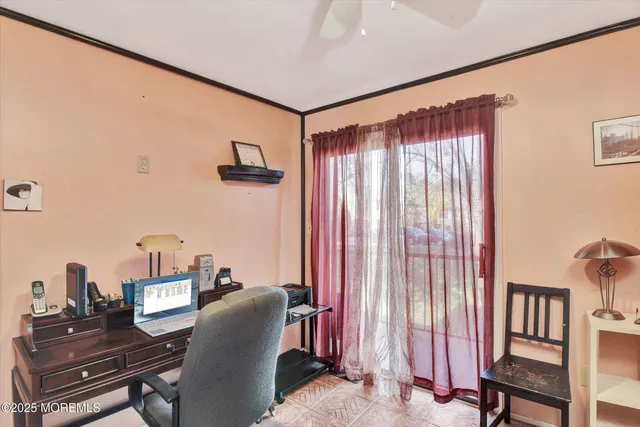 a workspace with furniture and a window