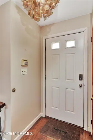 a view of a hallway with closet