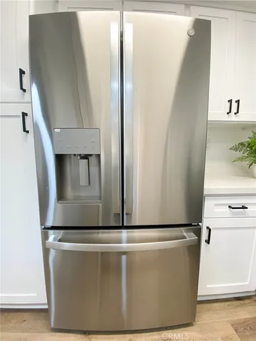 a view of living room with furniture and a window