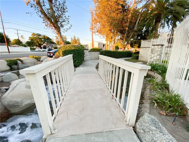 a view of a backyard of the house