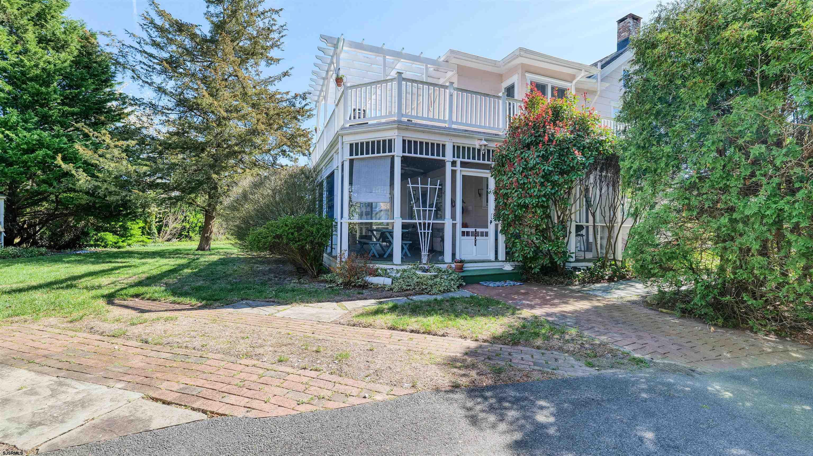 418 North Shore Road Beesleys Point, NJ 08223 - Photo 5 of 36 front view of a house with a yard