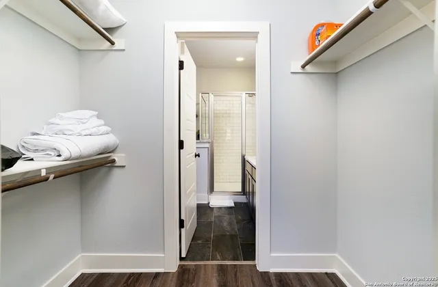 a bathroom with a double vanity sink mirror and double