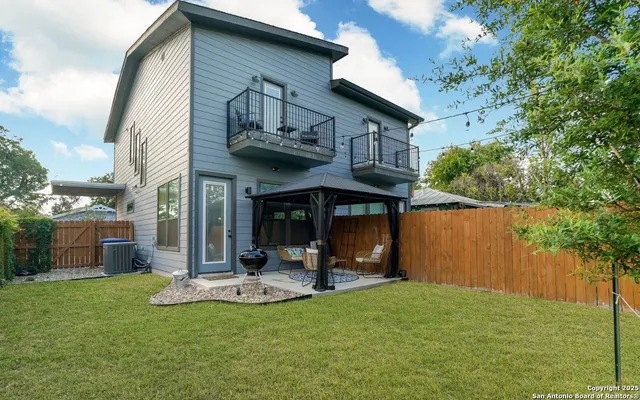 a view of a wooden door of the house