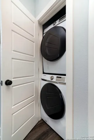 a utility room with dryer and washer