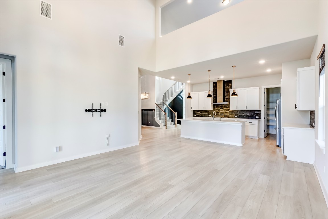 129 Cotton Tree Terrace Dripping Springs, TX 78620 - Photo 39 of 40 a view of kitchen with wooden floor
