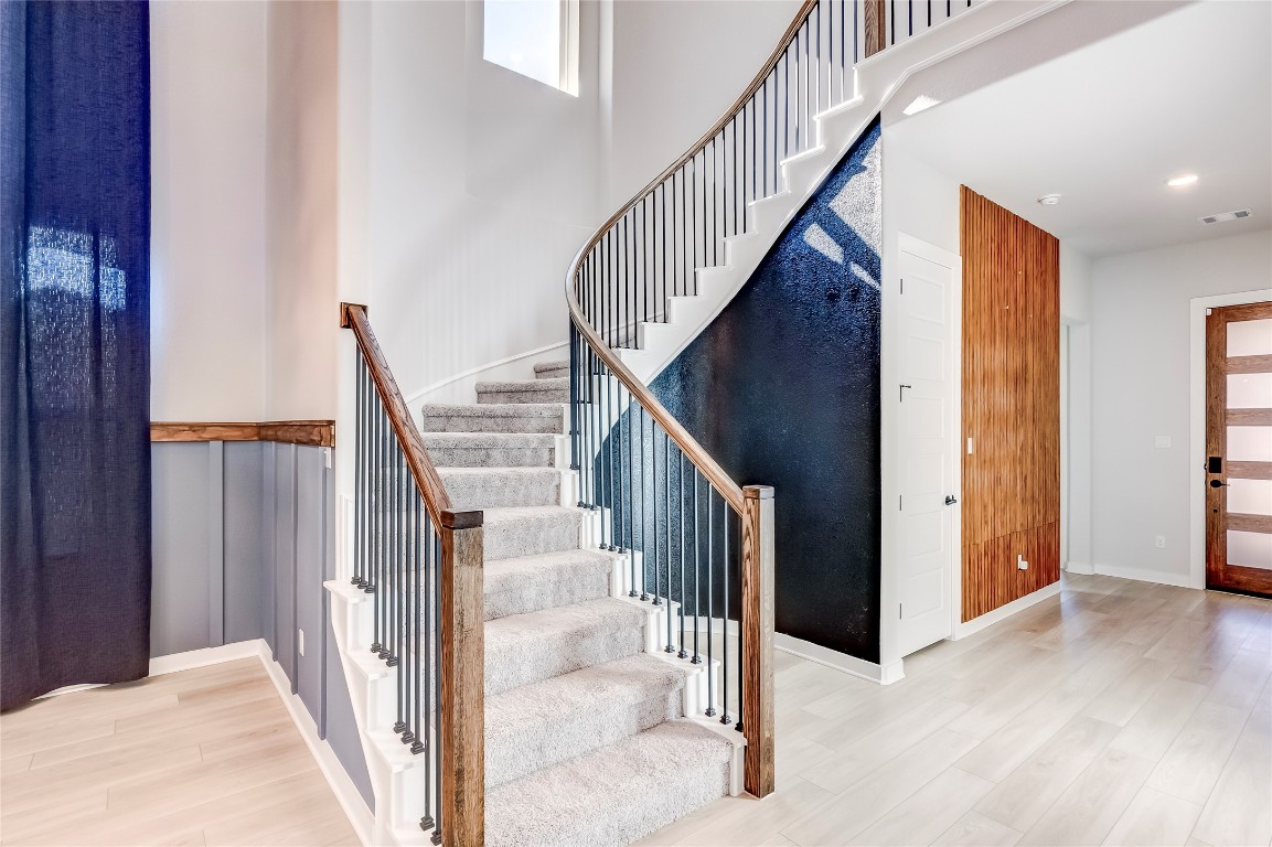 129 Cotton Tree Terrace Dripping Springs, TX 78620 - Photo 7 of 40 a view of entryway and hall with wooden floor