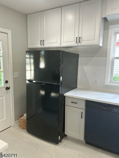 1324 George Street Plainfield, NJ 07062 - Photo 5 of 26 a kitchen with a cabinets and window