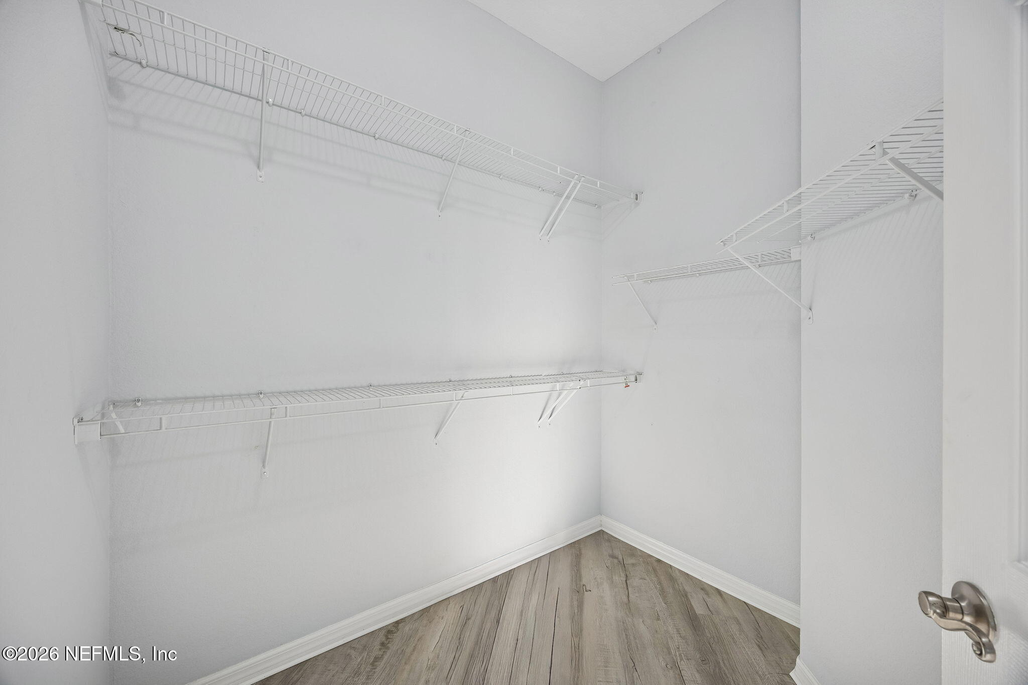 10150 Belle Rive Boulevard, Unit 1806 Jacksonville, FL 32256 - Photo 22 of 51 Walk In Closet Primary Bedroom