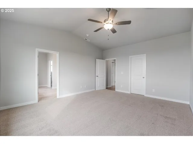 a bathroom with a granite countertop sink mirror and