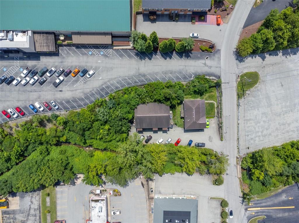80 Colony Drive Irwin, PA 15642 - Photo 7 of 11 an aerial view of a house with a yard and garden view