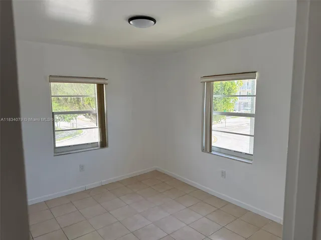 an empty room with a window