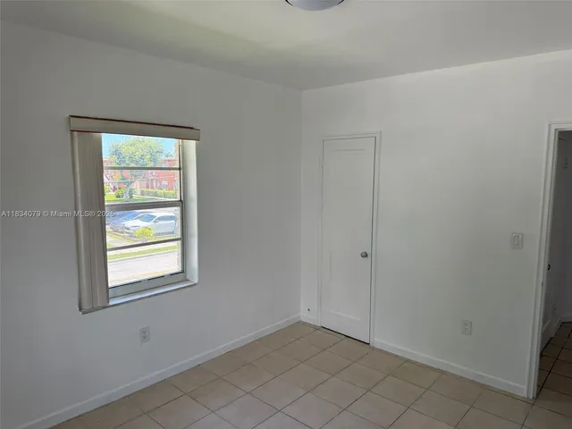a view of an empty room with window