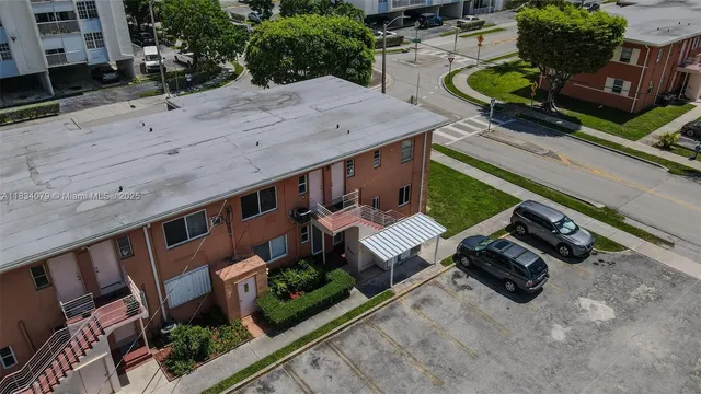 an aerial view of a house with garden