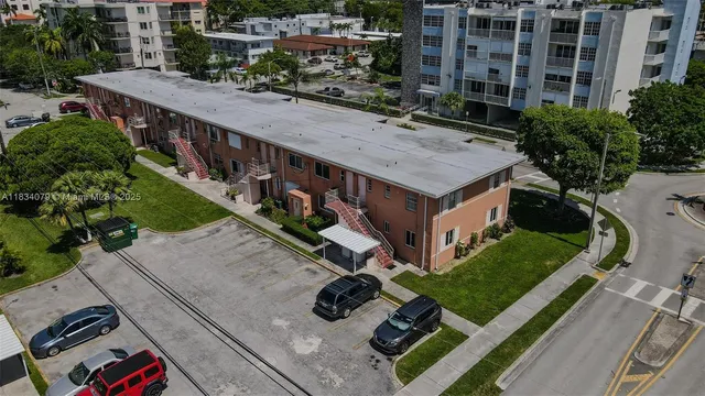 a view of a wooden deck and a patio