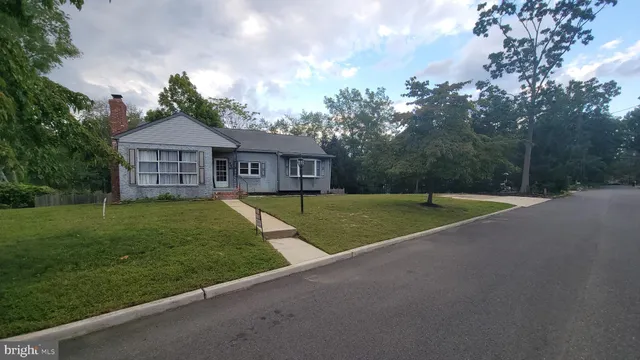 a view of a house with a big yard