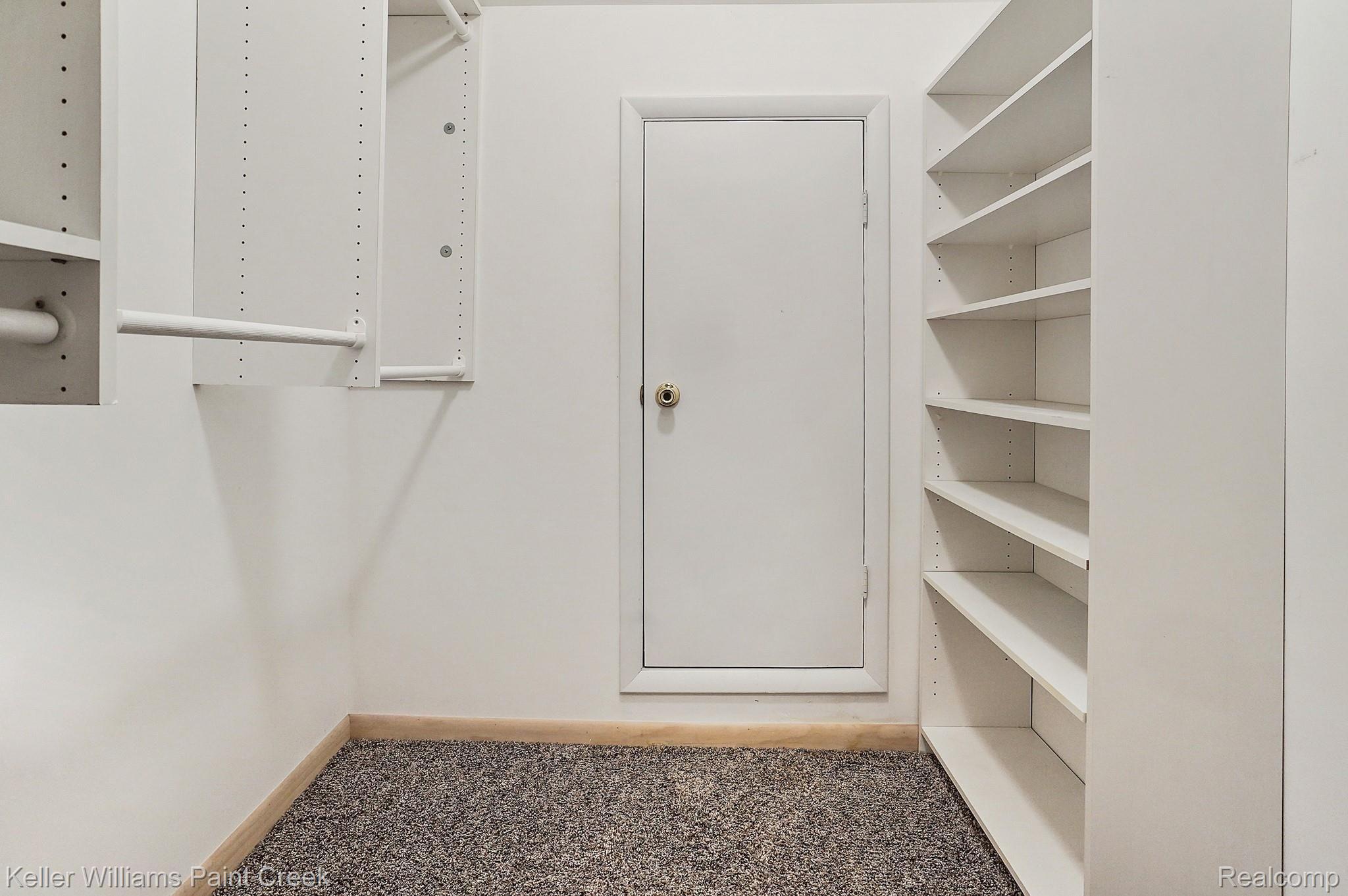 1300 John R Road Rochester, MI 48307 - Photo 42 of 60 One of two large walk-in Master closets