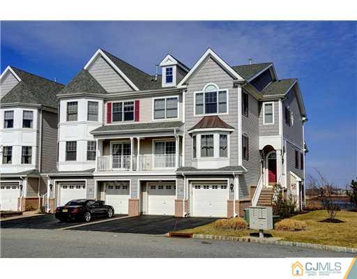 54 Raritan Reach Road South Amboy, NJ 08879 - Photo 1 of 23 a front view of a house with a yard