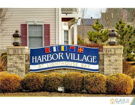 54 Raritan Reach Road South Amboy, NJ 08879 - Photo 2 of 23 a sign on the side of a building