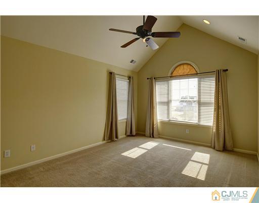 54 Raritan Reach Road South Amboy, NJ 08879 - Photo 16 of 23 a view of room with a window and a ceiling fan