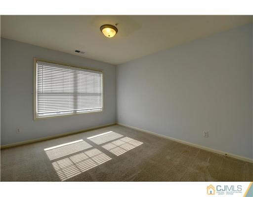 54 Raritan Reach Road South Amboy, NJ 08879 - Photo 20 of 23 a view of an empty room and window