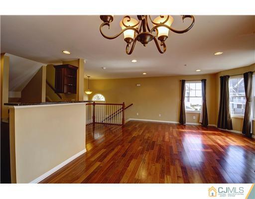 54 Raritan Reach Road South Amboy, NJ 08879 - Photo 9 of 23 a view of a room with wooden floor and windows