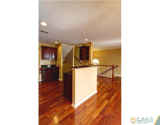 54 Raritan Reach Road South Amboy, NJ 08879 - Photo 10 of 23 a view of a living room with kitchen and a sink