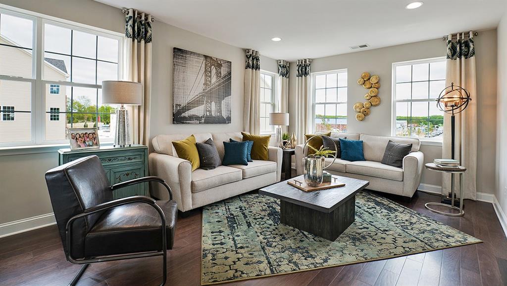 1402 Hights Farm Road South Raleigh, NC 27603 - Photo 17 of 25 a living room with furniture and a large window