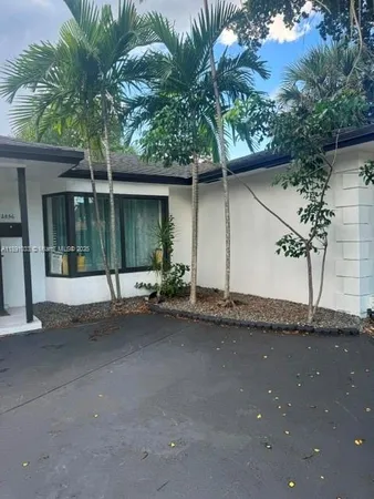 a house view with a outdoor space