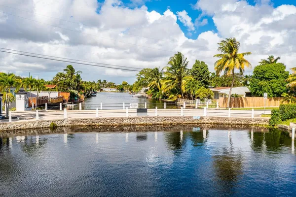 a view of swimming pool with outdoor seating