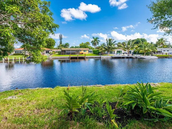 a view of a lake with a house