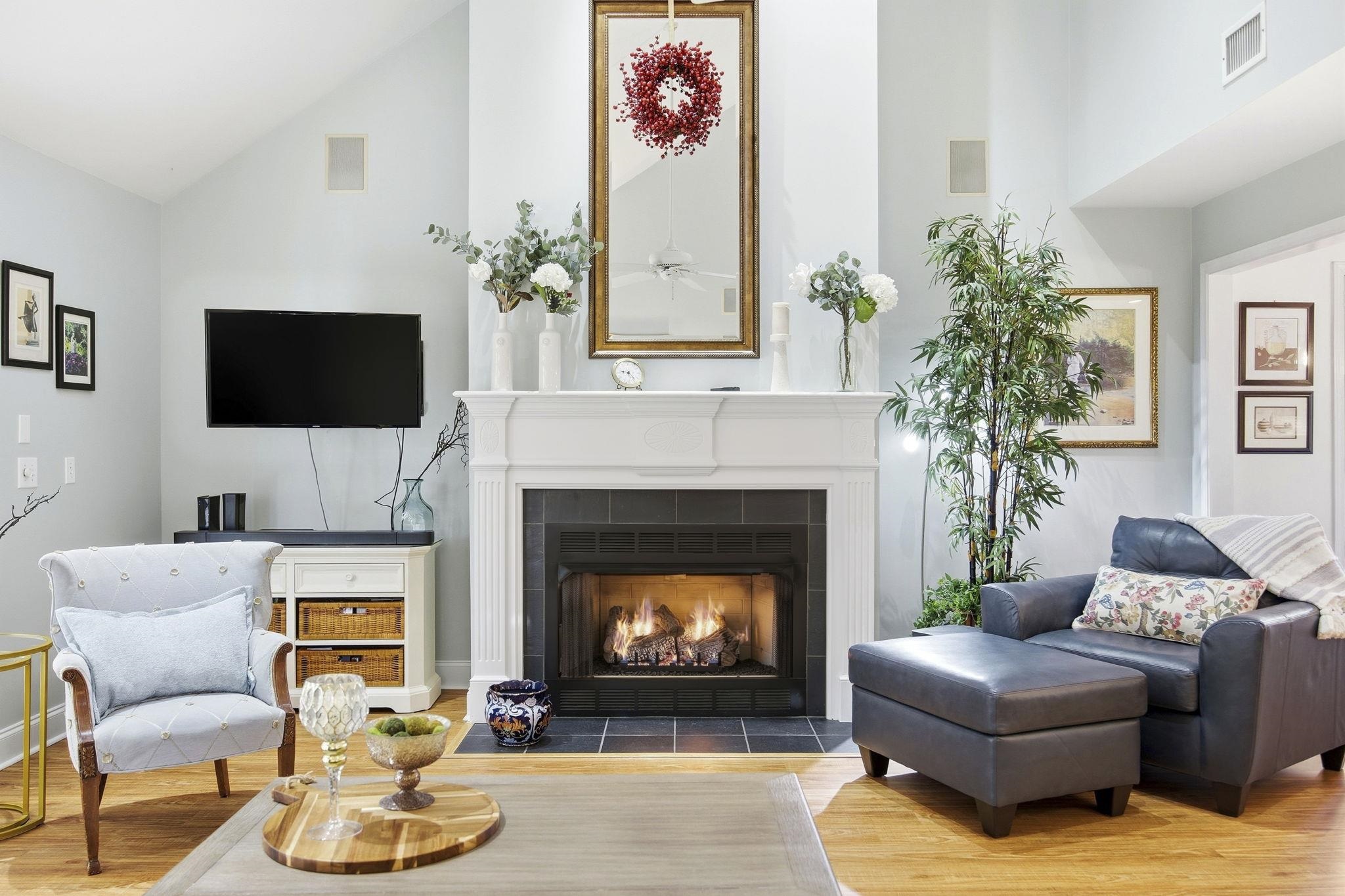 1301 Regent Terrace North Surfside Beach, SC 29575 - Photo 11 of 40 Sitting room with a tiled fireplace, high vaulted ceiling, wood finished floors, and ceiling fan
