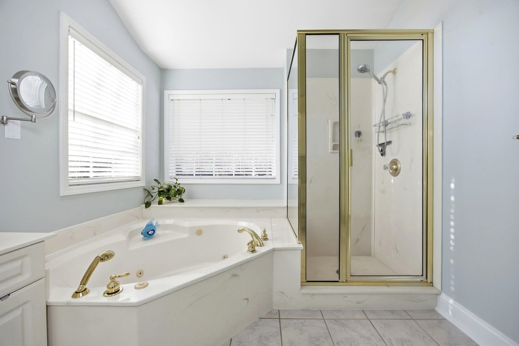 1301 Regent Terrace North Surfside Beach, SC 29575 - Photo 24 of 40 Full bath featuring a marble finish shower, a whirlpool tub, and vanity