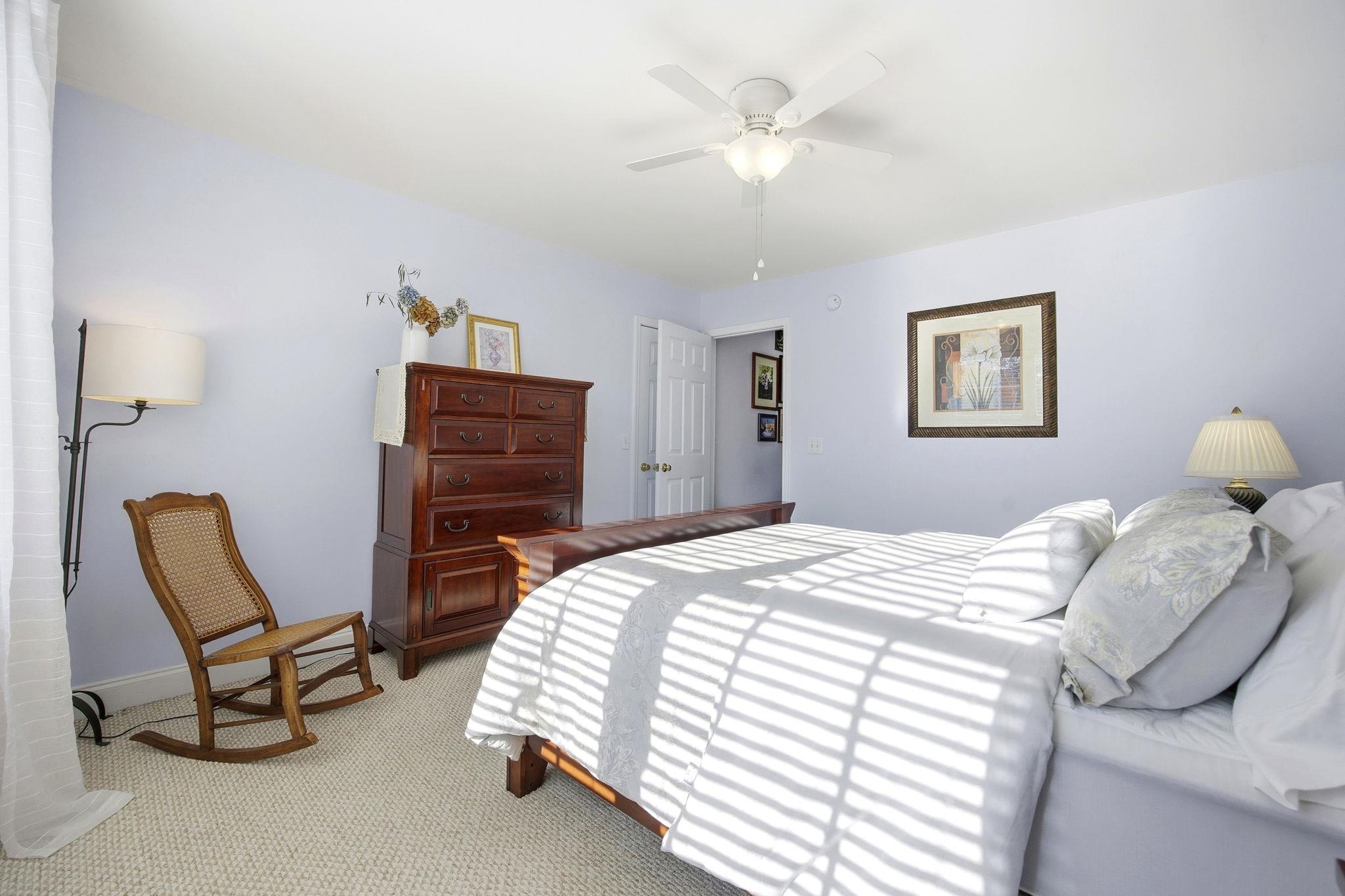1301 Regent Terrace North Surfside Beach, SC 29575 - Photo 26 of 40 Carpeted bedroom featuring ceiling fan and baseboards