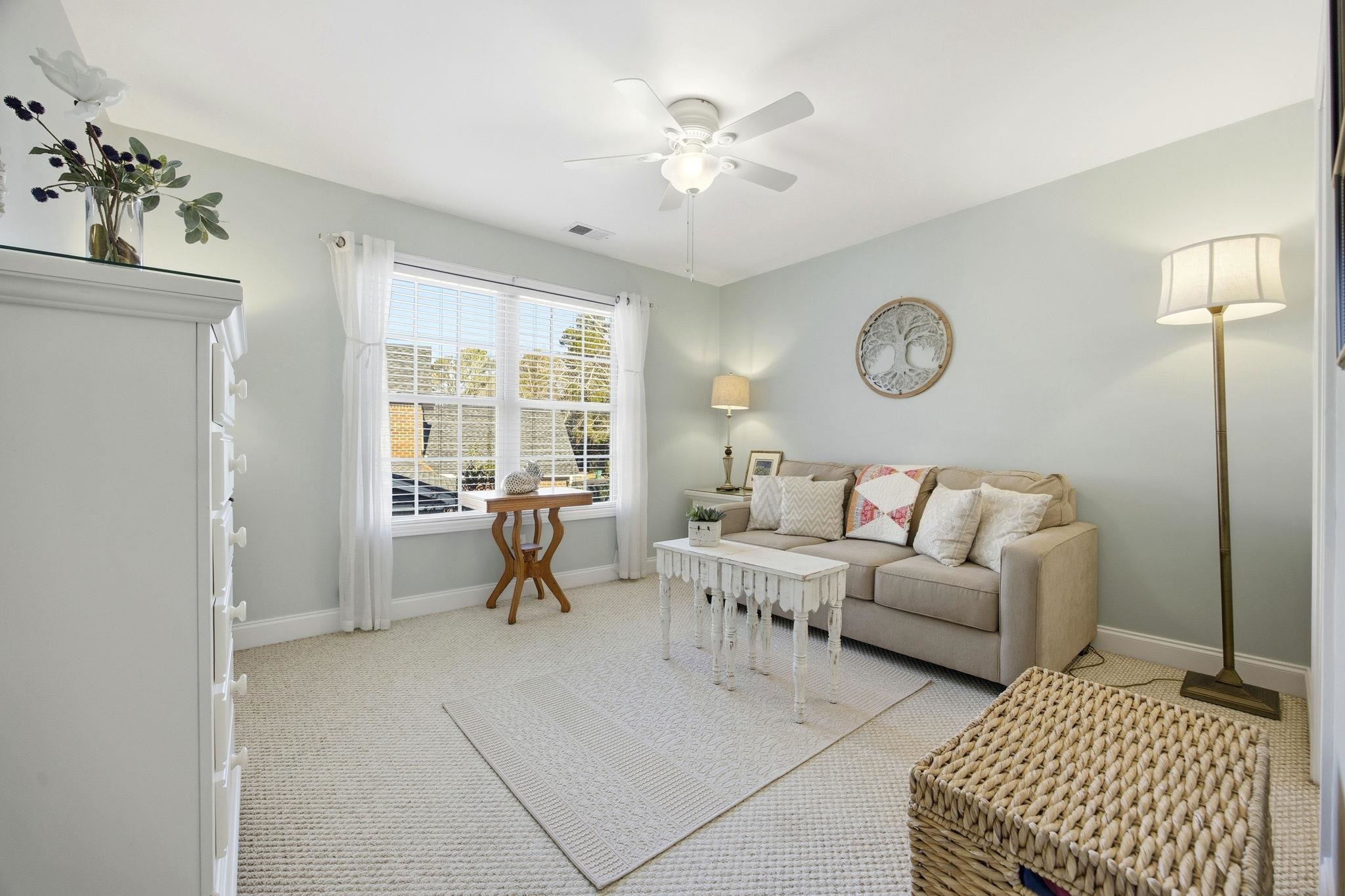 1301 Regent Terrace North Surfside Beach, SC 29575 - Photo 28 of 40 Living area featuring ceiling fan and light carpet