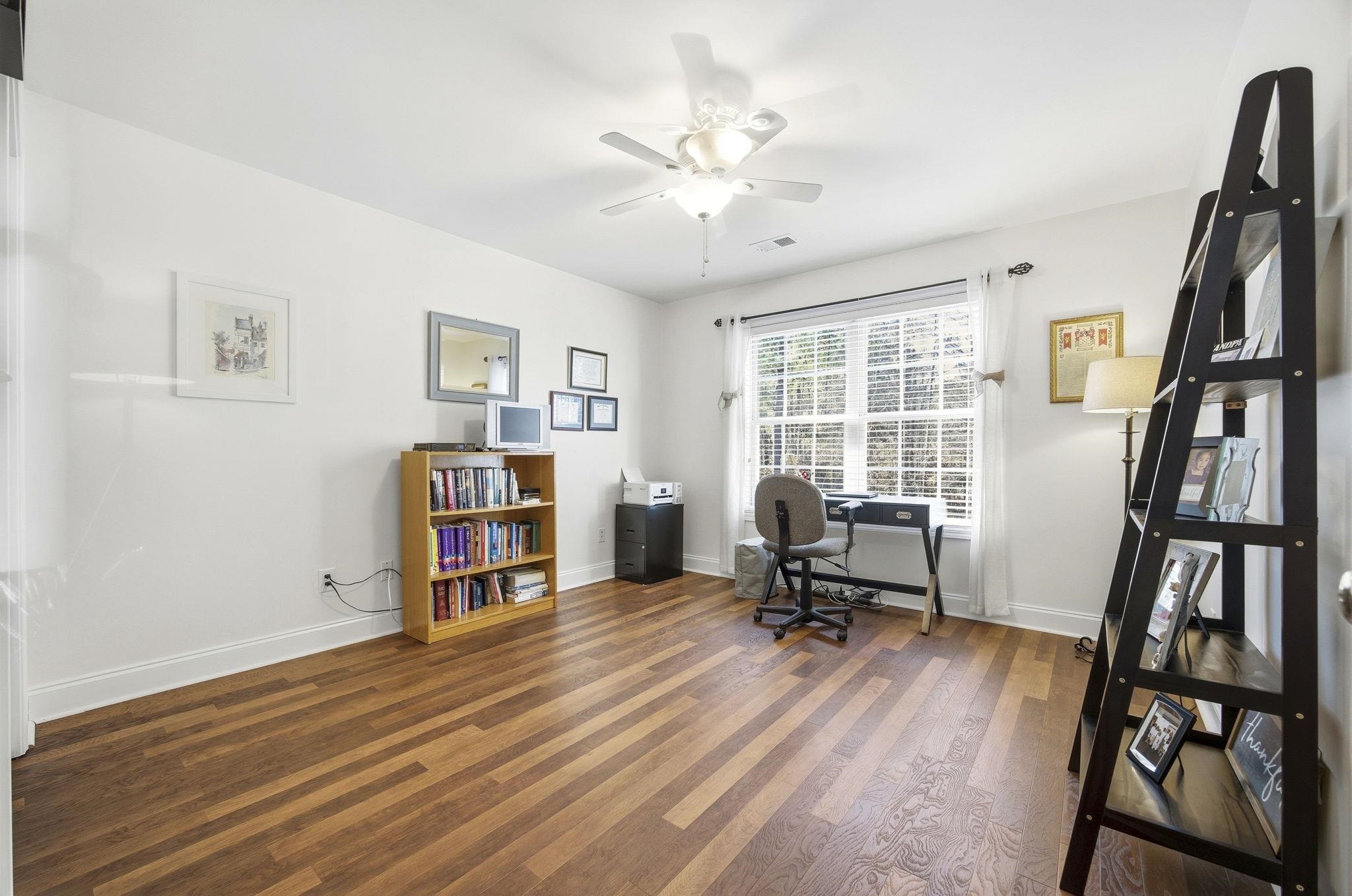 1301 Regent Terrace North Surfside Beach, SC 29575 - Photo 31 of 40 Office with dark wood finished floors and ceiling fan