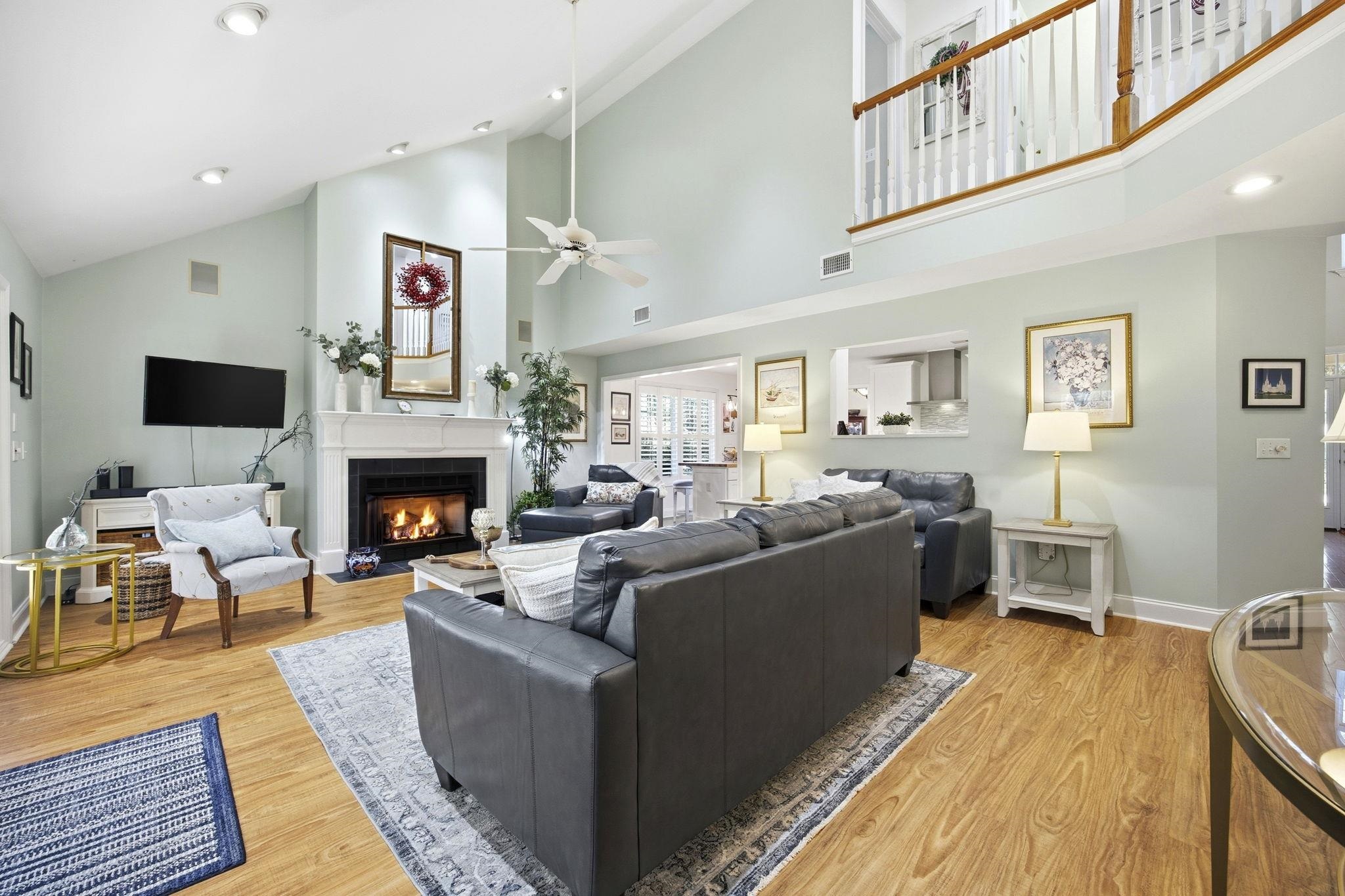 1301 Regent Terrace North Surfside Beach, SC 29575 - Photo 10 of 40 Living area featuring high vaulted ceiling, a fireplace with flush hearth, light wood-type flooring, recessed lighting, and a ceiling fan