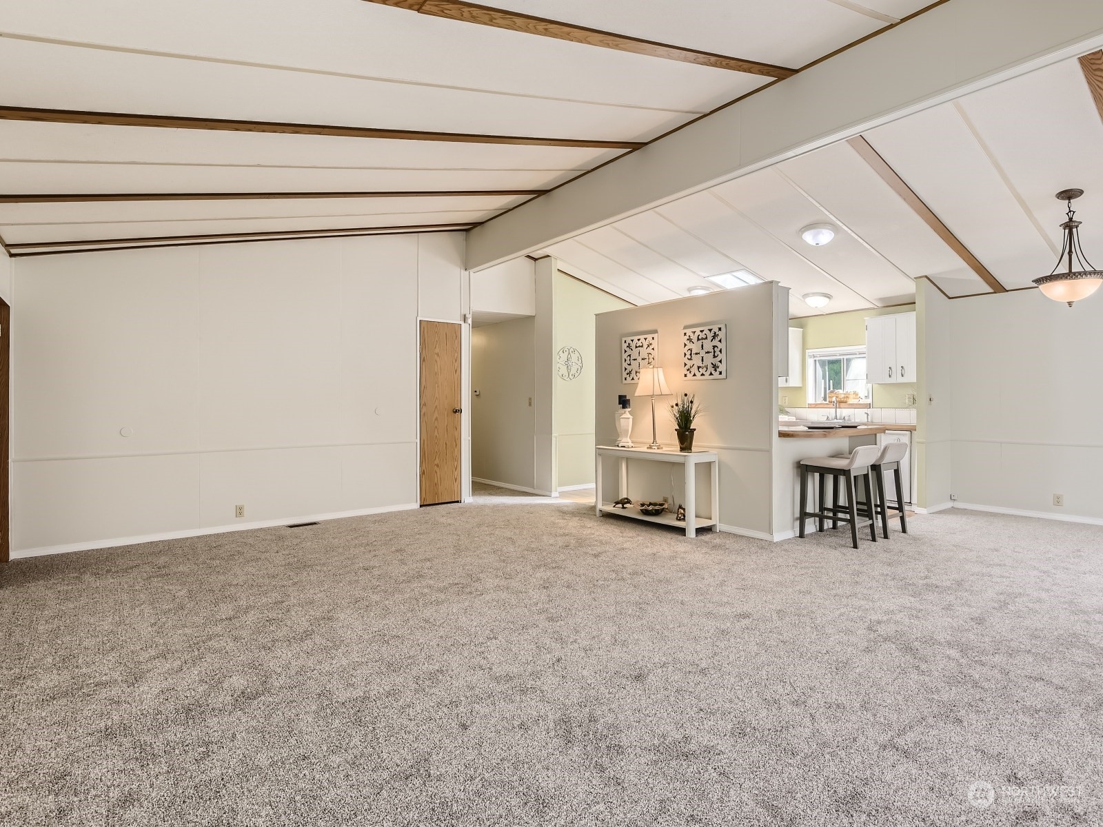 20614 West Richmond Road Bothell, WA 98021 - Photo 8 of 24 a view of a livingroom with furniture and windows