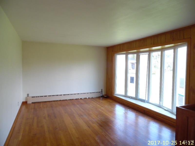 731 Point Phillips Road Bath, PA 18014 - Photo 5 of 22 a view of an empty room with wooden floor and a window