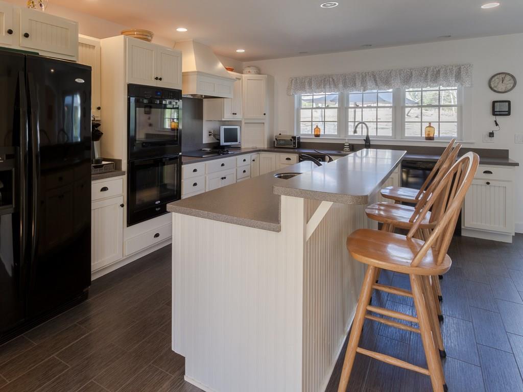 86 Spring Hill Loop Chamberlain, ME 04541 - Photo 29 of 35 Large eat-in kitchen