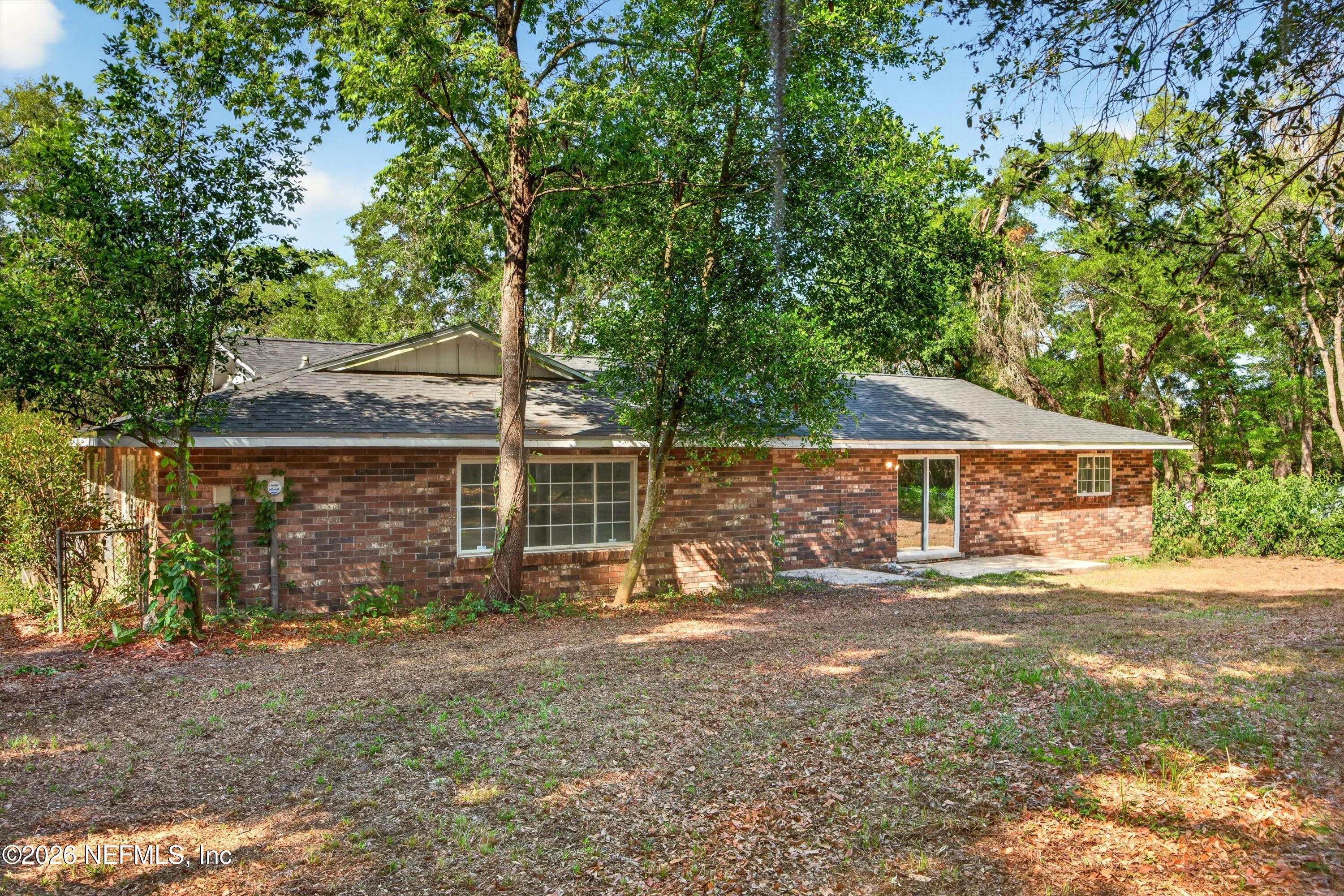 6894 Ridge Street Keystone Heights, FL 32656 - Photo 35 of 40 a view of a house with backyard and garden