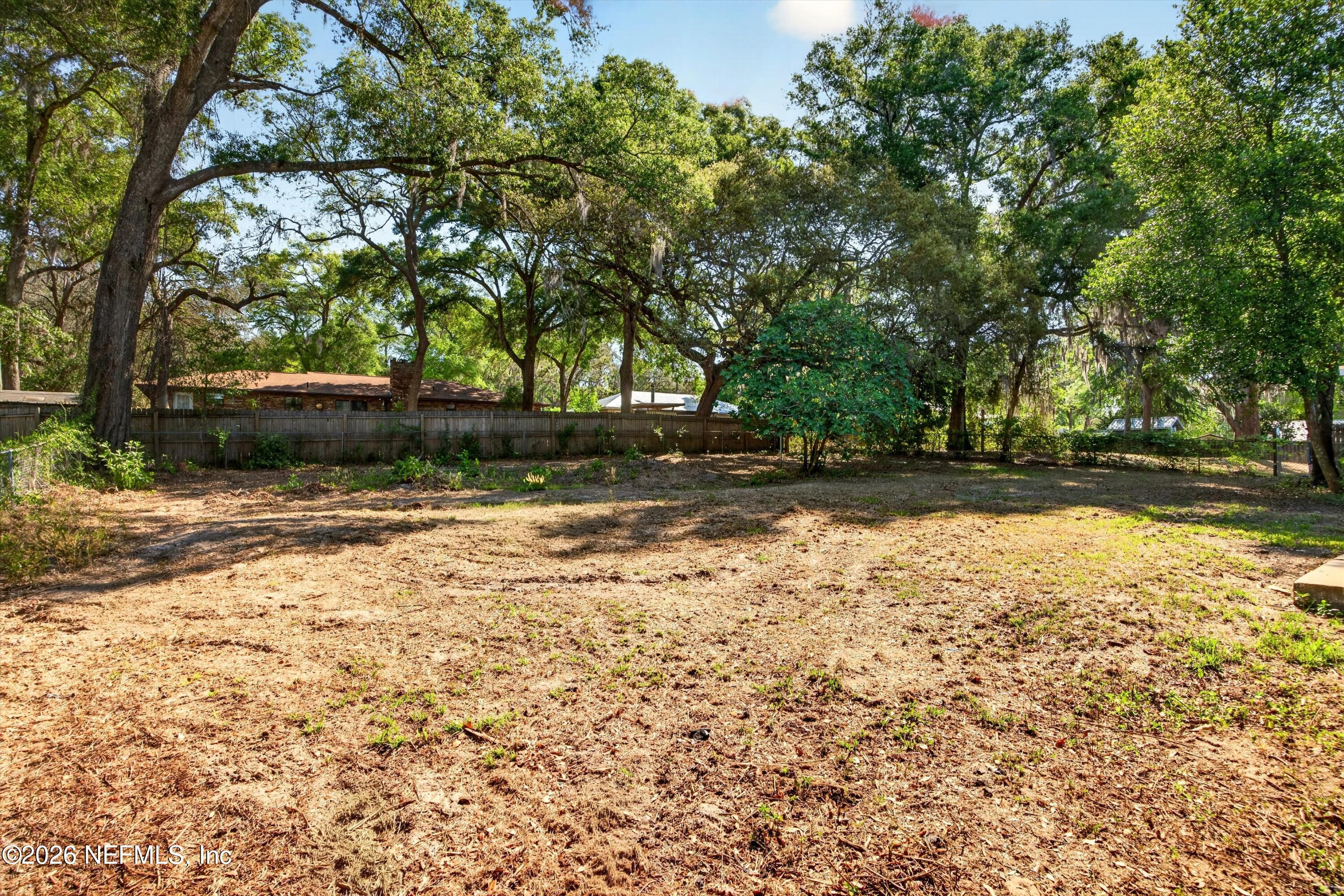 6894 Ridge Street Keystone Heights, FL 32656 - Photo 37 of 40 a backyard of a house with lots of green space