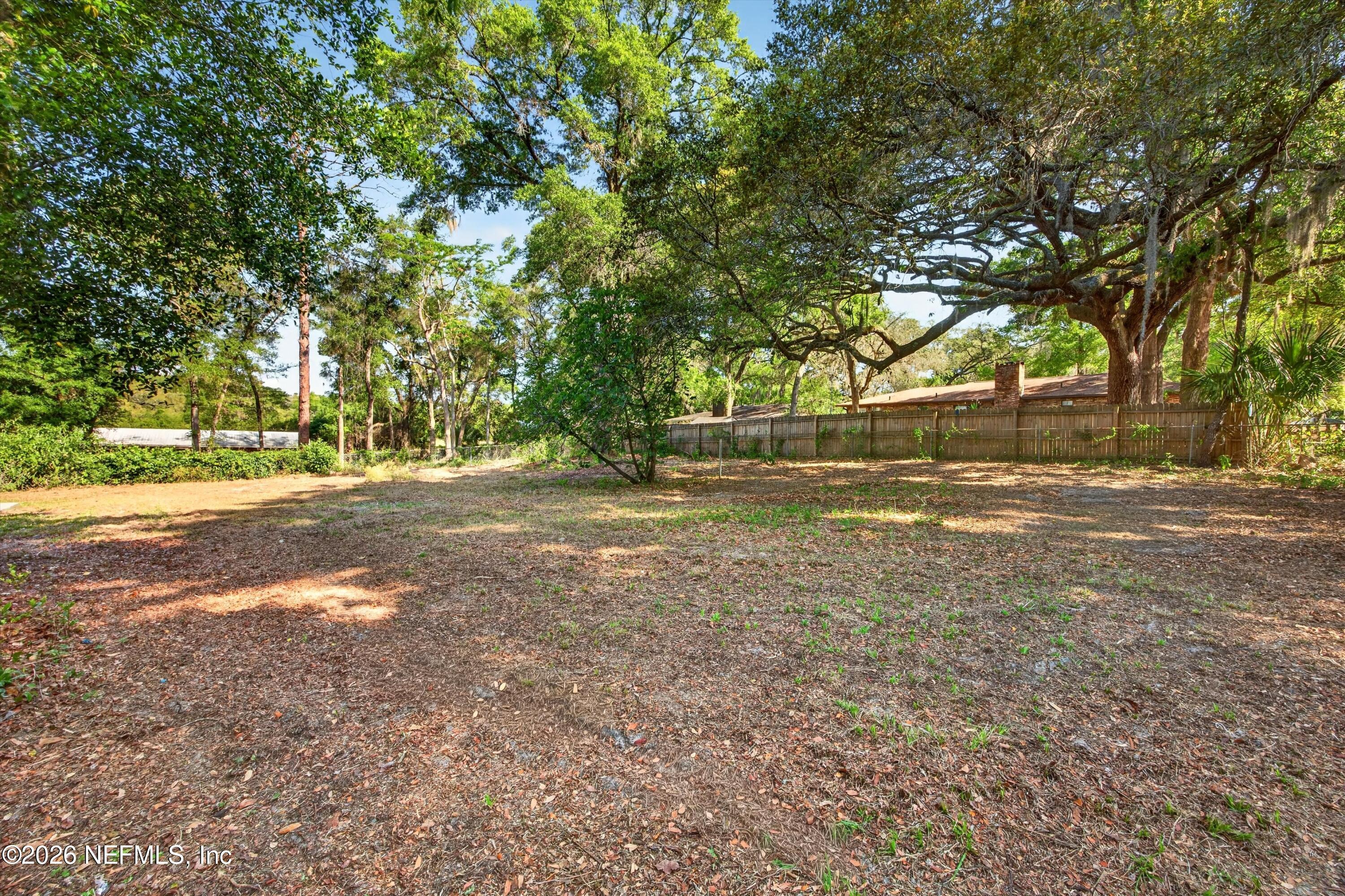 6894 Ridge Street Keystone Heights, FL 32656 - Photo 38 of 40 a view of dirt yard with large trees