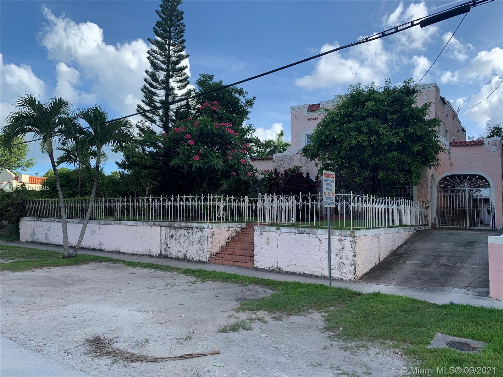 252 Southwest 20th Road Miami, FL 33129 - Photo 2 of 8 a view of a yard with a slide
